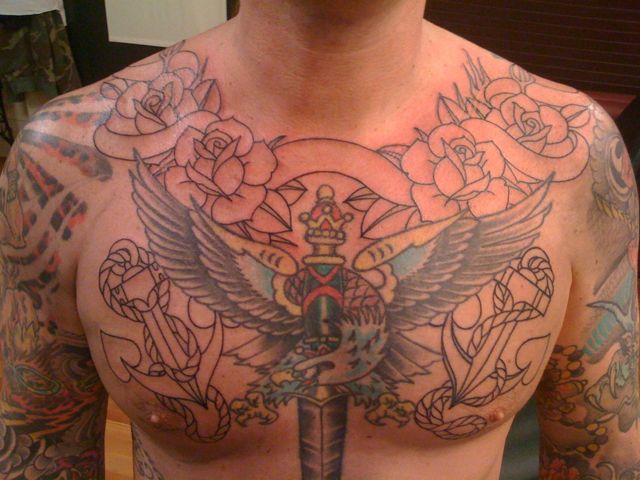 He also has the Rattlesnake/ roses backpiece and two sleeves.